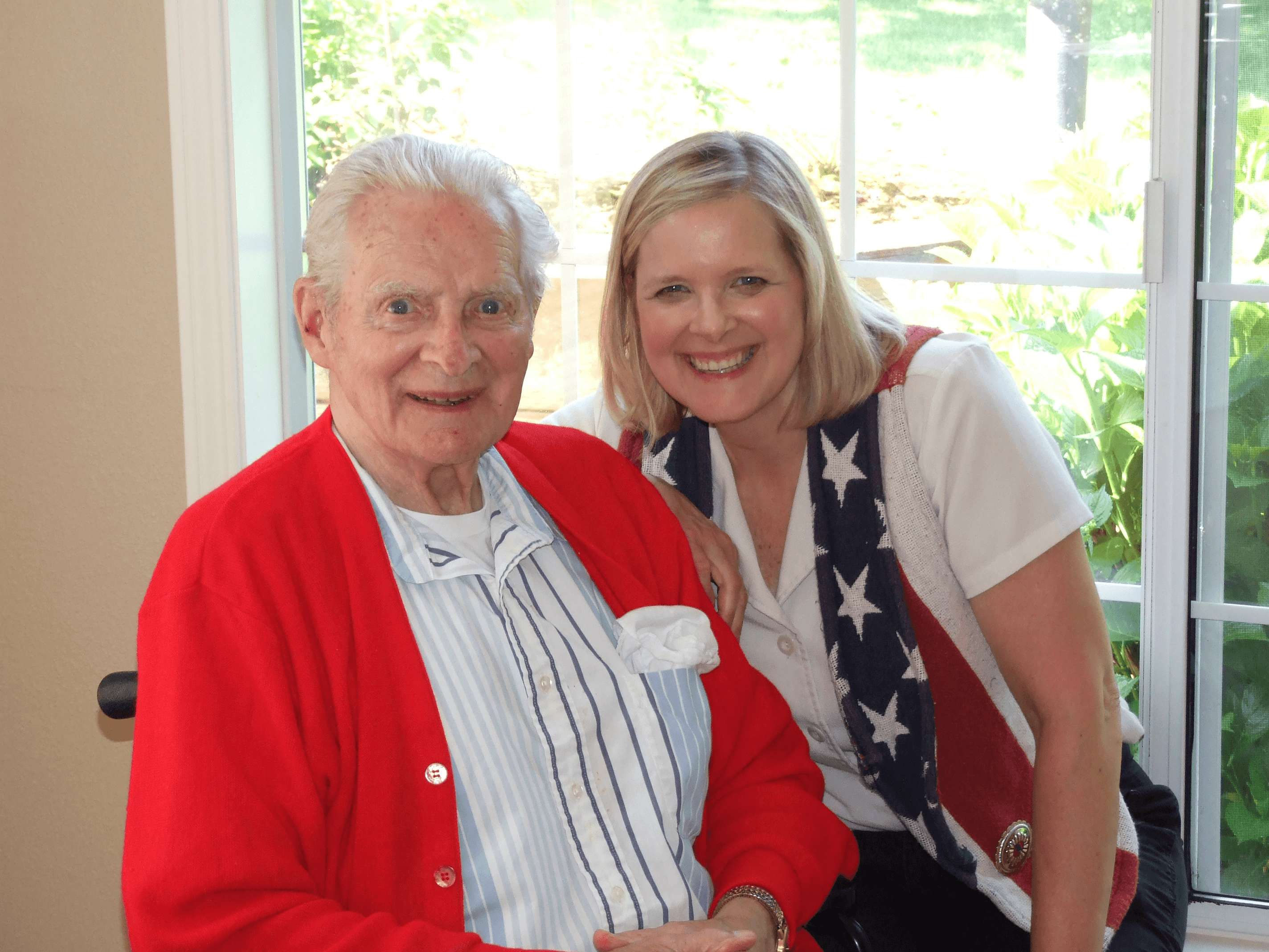 Resident and Family in Red and Patriotic Sweaters